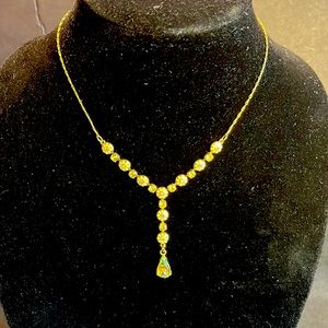 Avon gold tone Y necklace pale yellow citrine stones with white enamel daisy